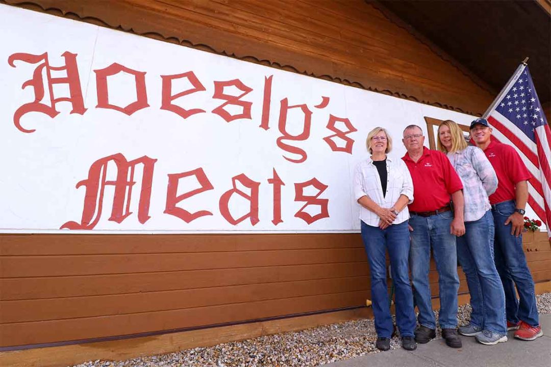 Photo of the Hoesly family in front of their meat shop.