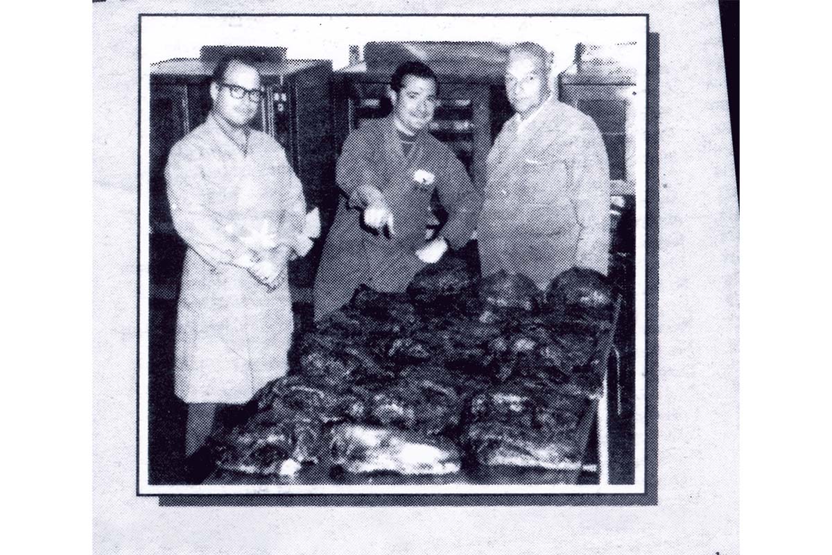 The Savals at work in meat processing facility
