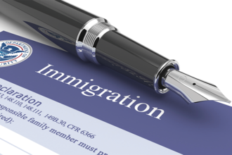 Pen and immigration papers