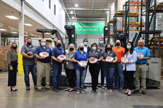 Regional Food Bank of Oklahoma team with Seaboard Foods' ham donation