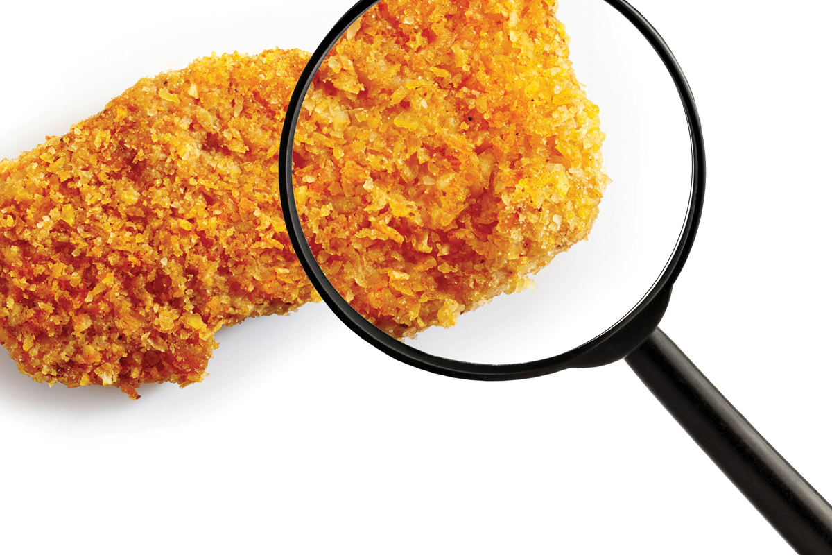 Chicken nugget in magnifying glass