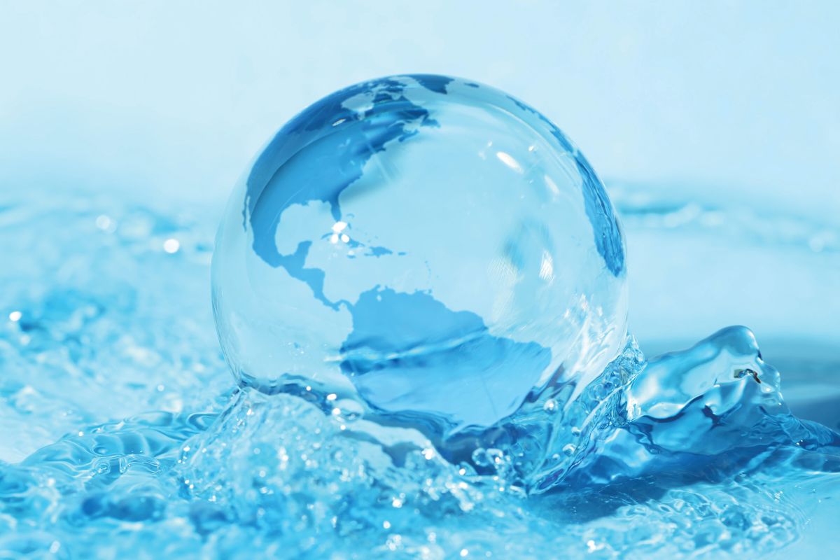globe made out of and surrounded by water