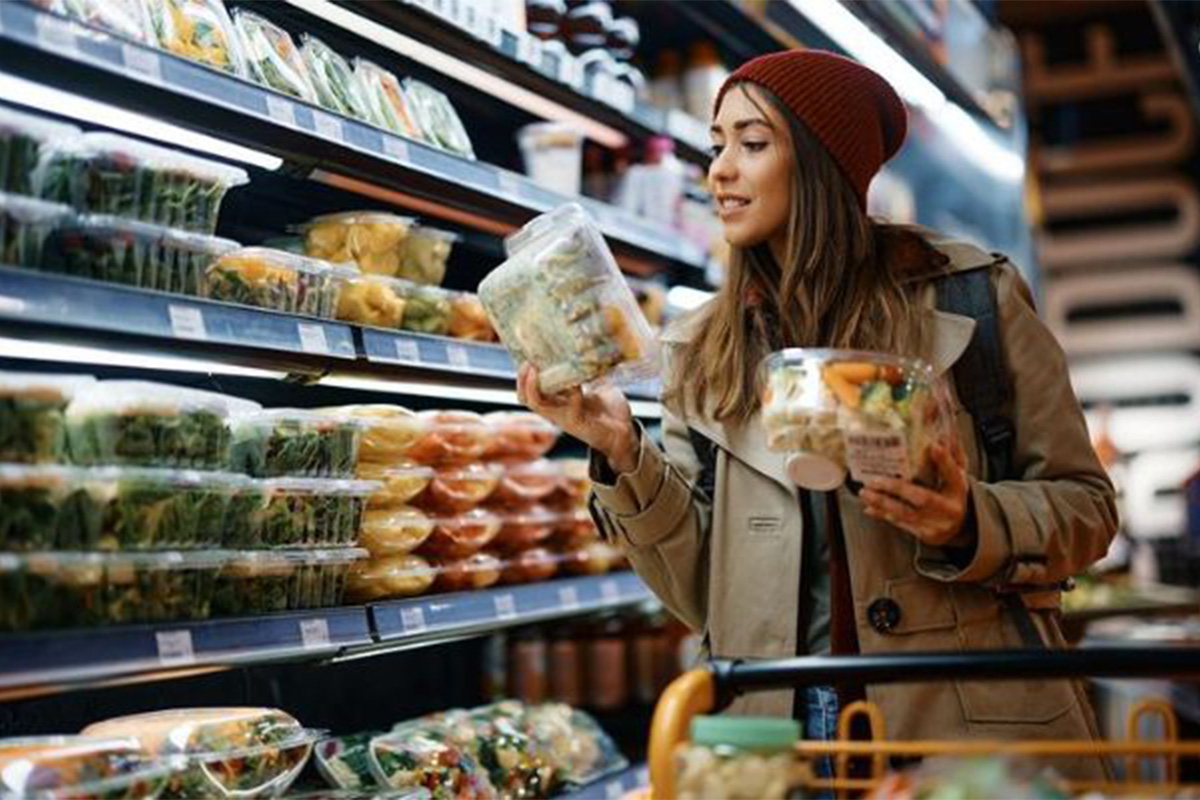 Consumer grocery shopping with cart