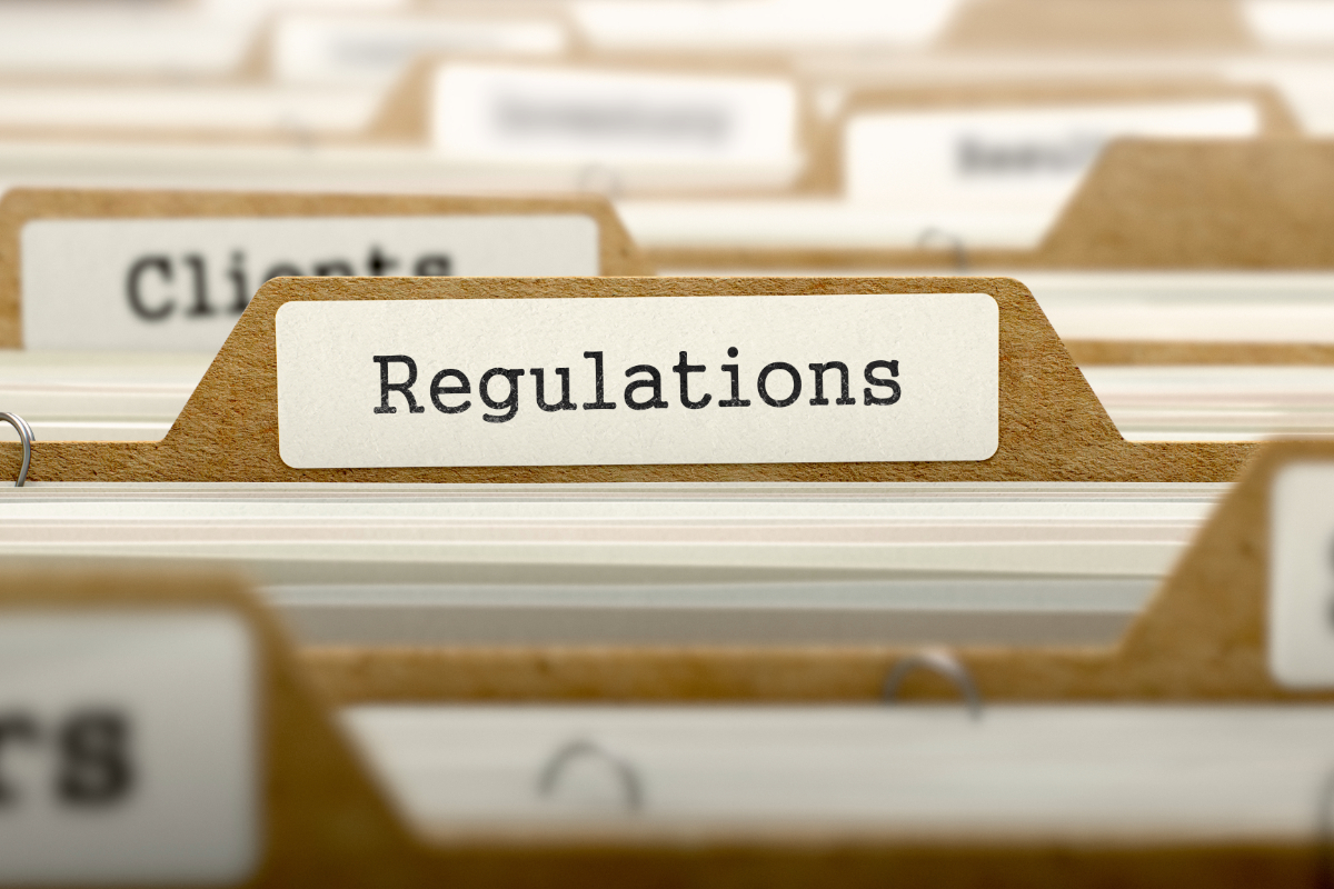 Regulations written on file folder tab