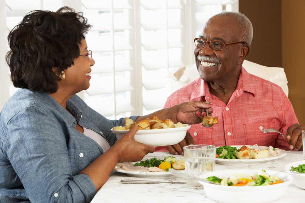 African-American couple having dinner